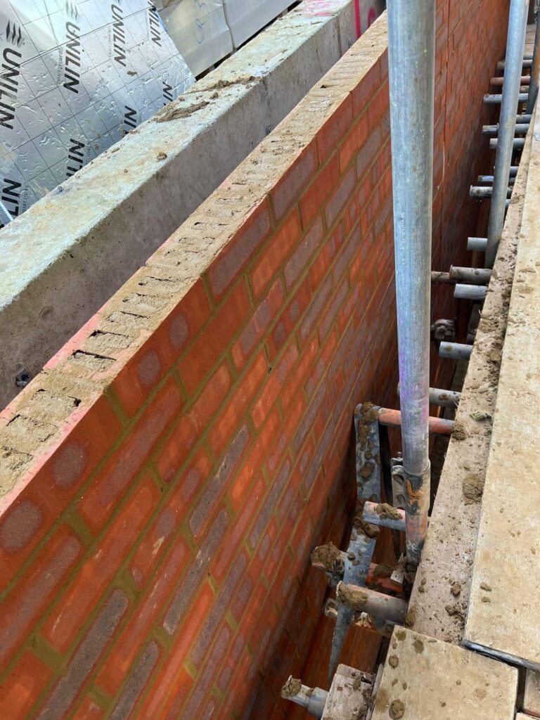 Romford: RM5 New build, brick work wall with insulation