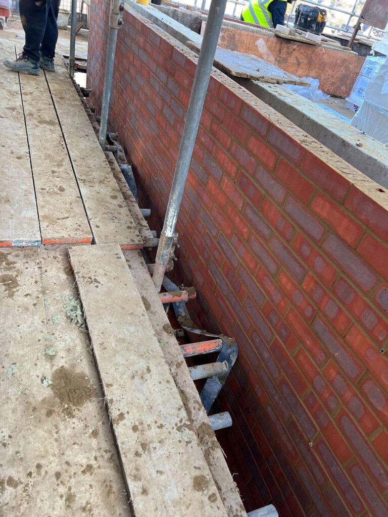 Romford: RM5 New build, brick work wall with insulation